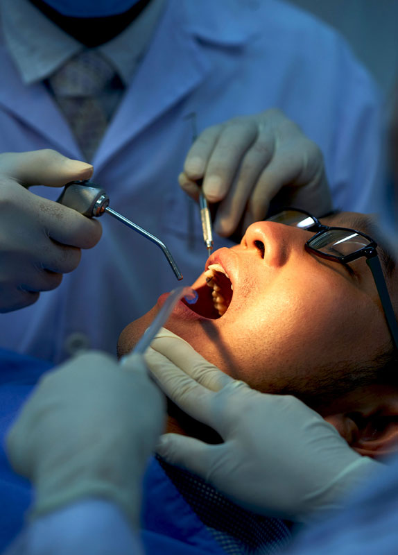 Patient undergoing dental surgery in Raleigh, NC